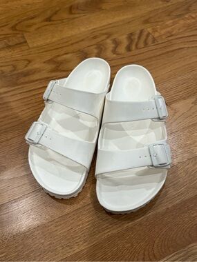 Birkenstock White EVA Arizona Essentials 
Two-Strap Slide Sandals